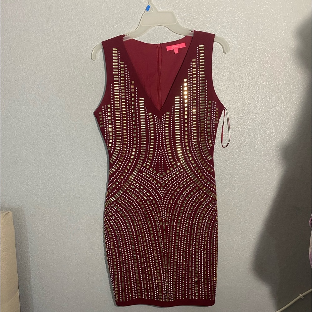 Maroon mini dress with silver and gold stones